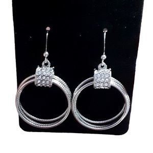 Silver fishhook earrings with diamond like stones for woman.